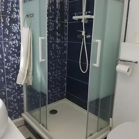 O 3 Parasols Pensión Sète